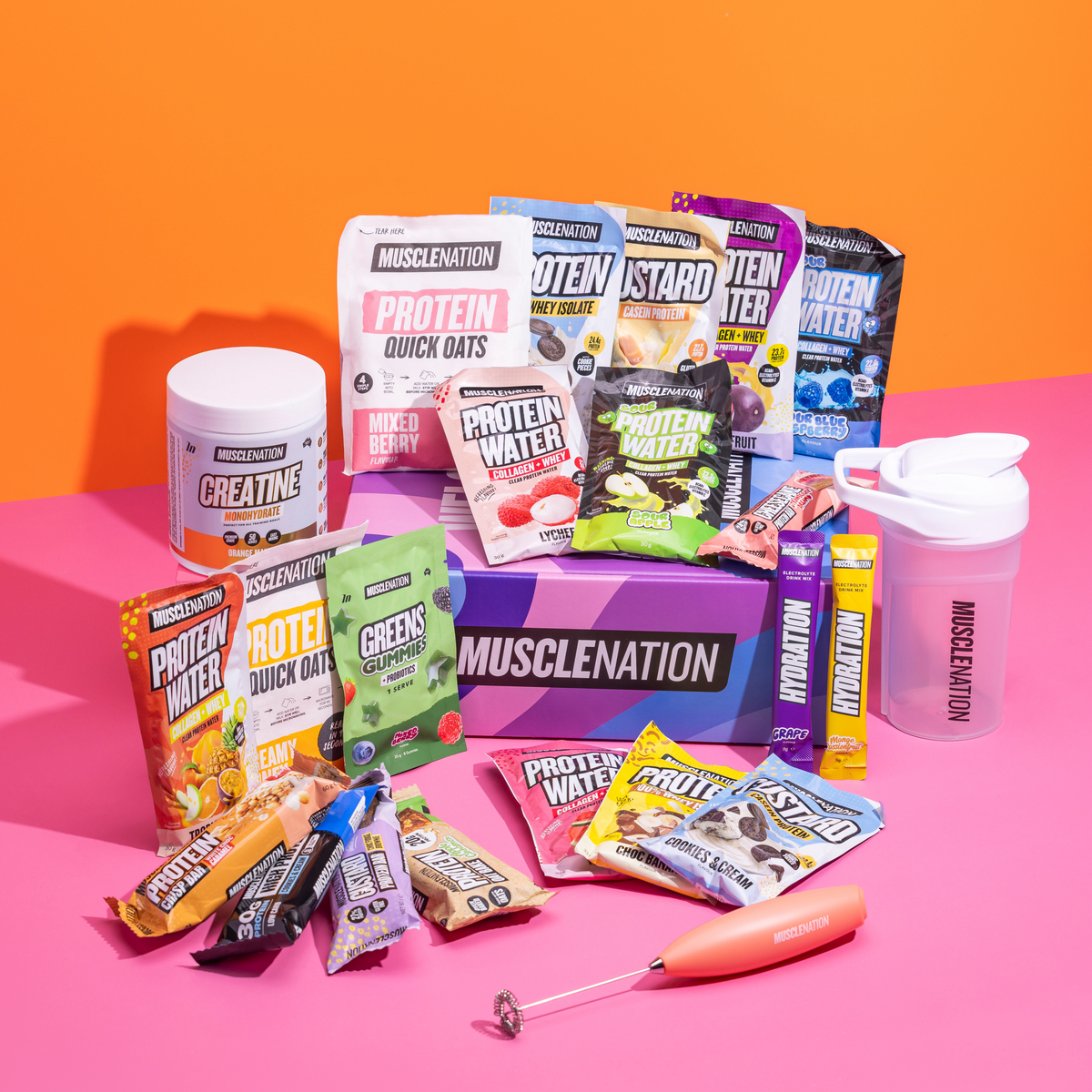 Try Everything Pack - Muscle Nation protein water, whey, custard and hydration sample sachets, flavoured creatine, protein bars, oats, greens gummies, 500ml shaker and electric mixer