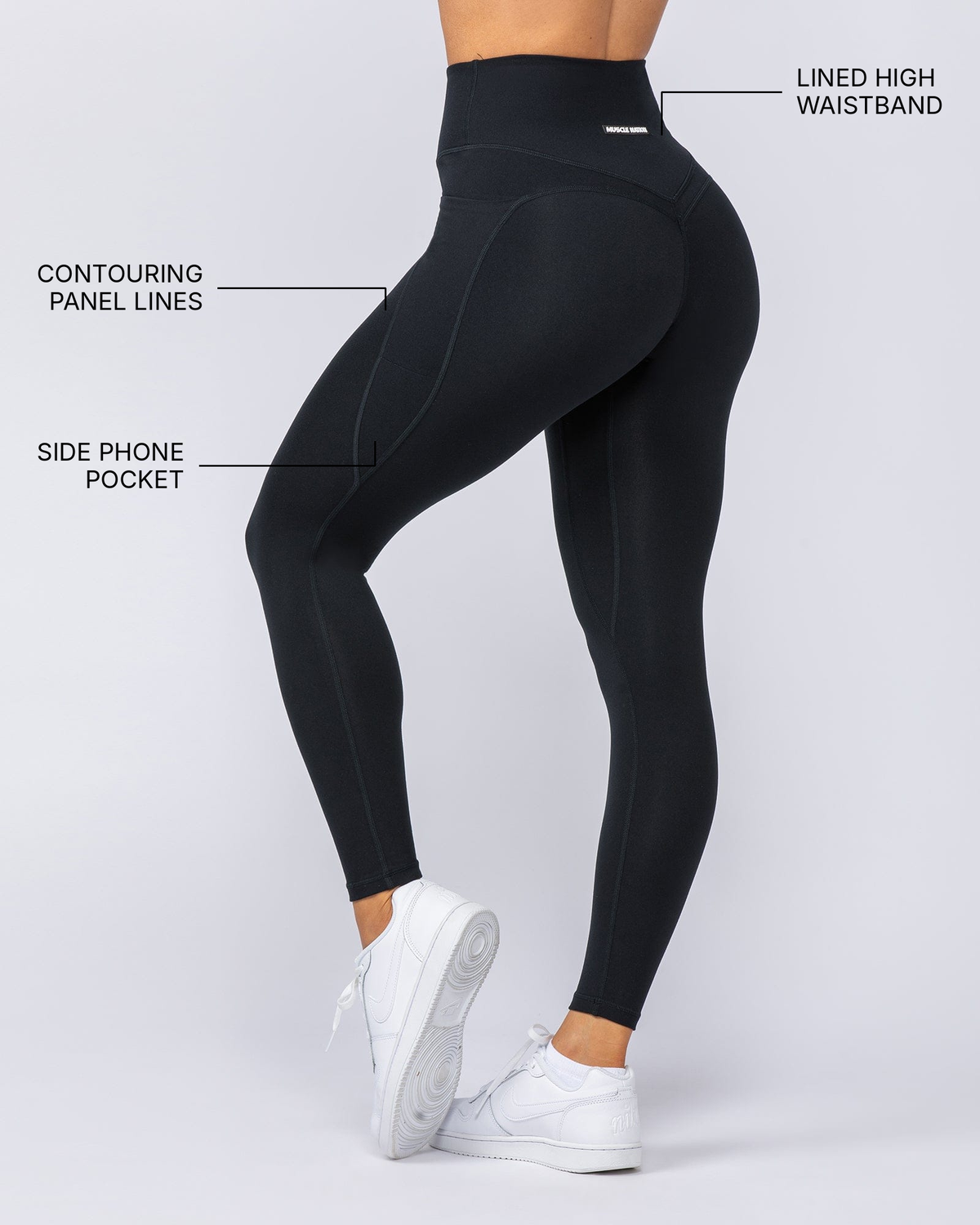 Booty Shaper Pocket Ankle Length Leggings - Black - Muscle Nation feature callouts: contouring panel lines, side phone pocket, lined high waistband