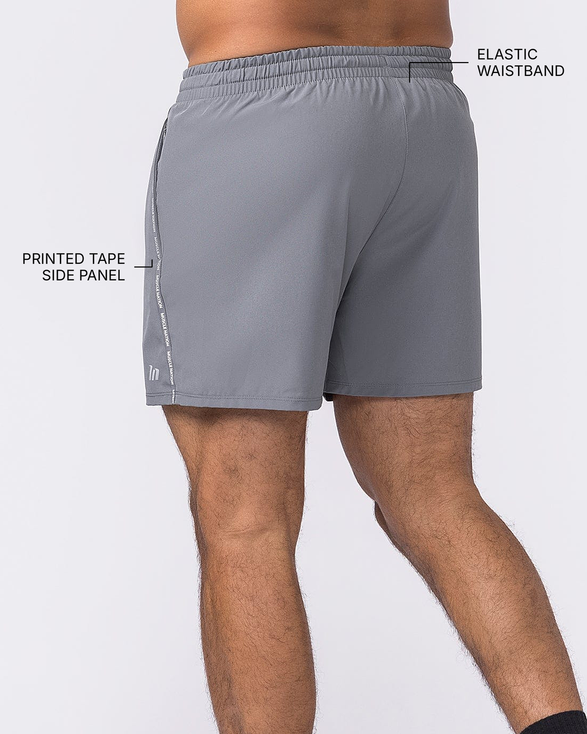 Iconic New Heights 4" Shorts - Tornado - Muscle Nation feature callouts: printed tape side panel, elastic waistband