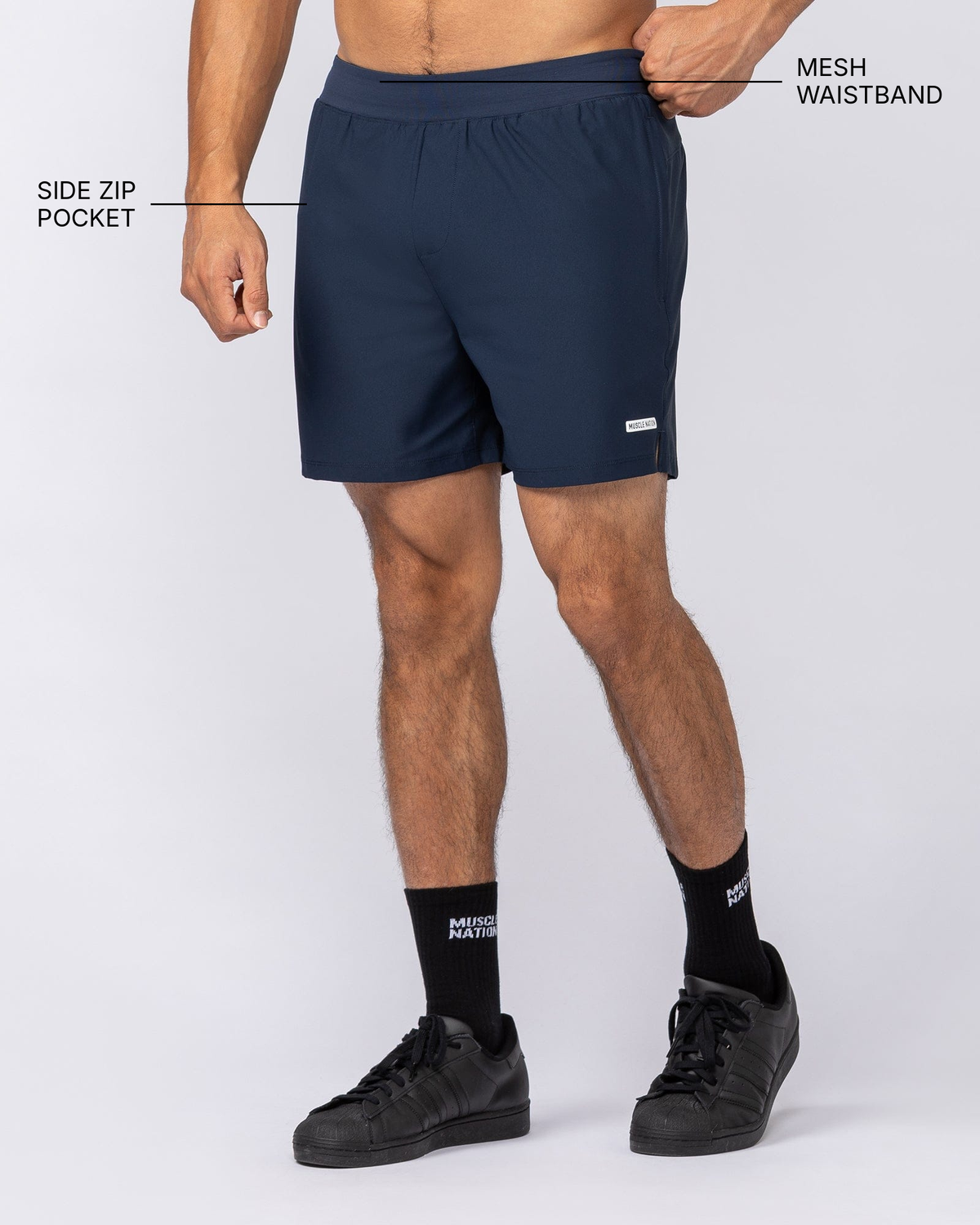 On Repeat Training 5" Shorts - Navy - Muscle Nation feature callouts: mesh waistband, side zip pocket