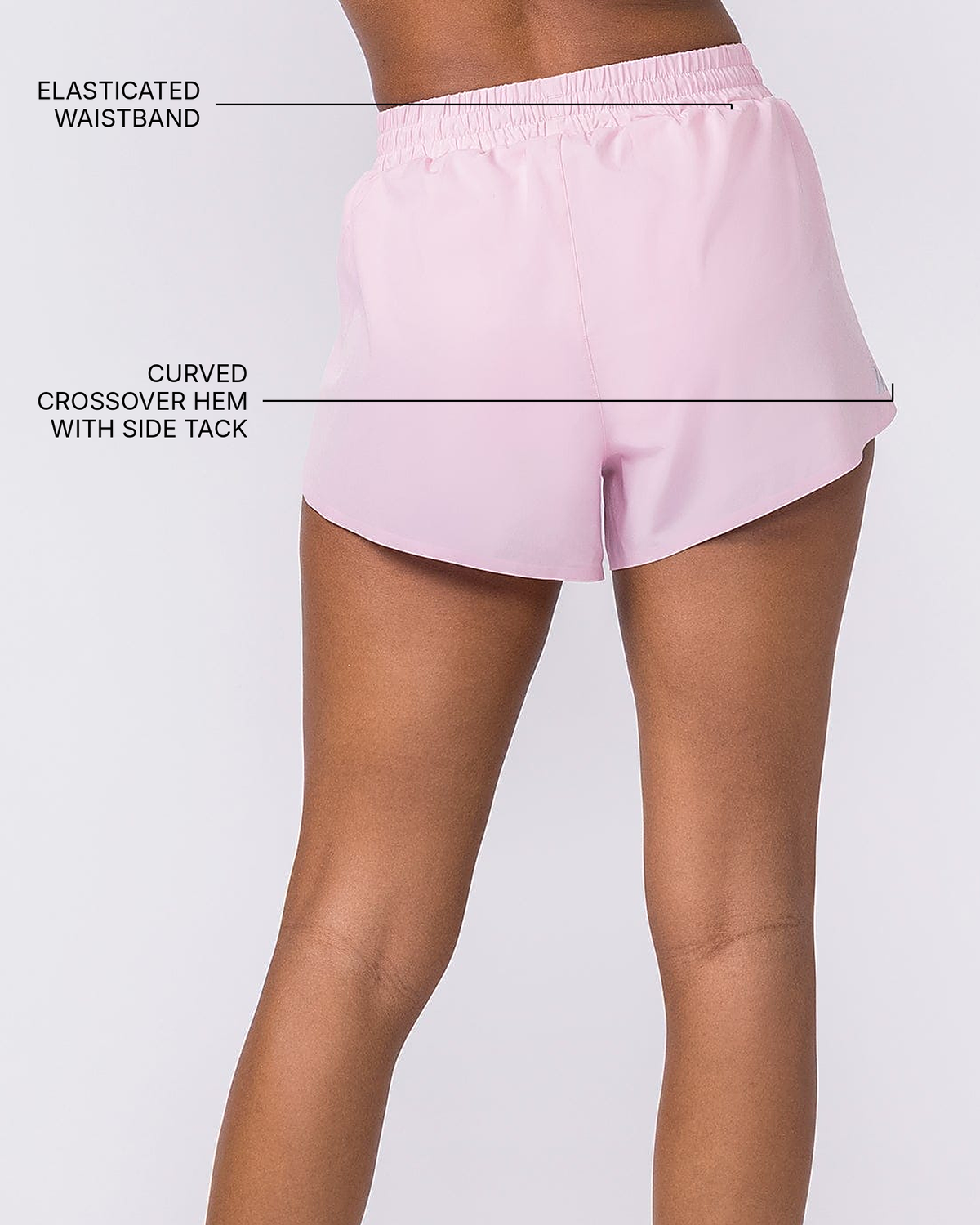 Pace 3" High-Waisted Run Shorts - Blossom - Muscle Nation feature callouts: elasticated waistband, curved crossover hem with side tack