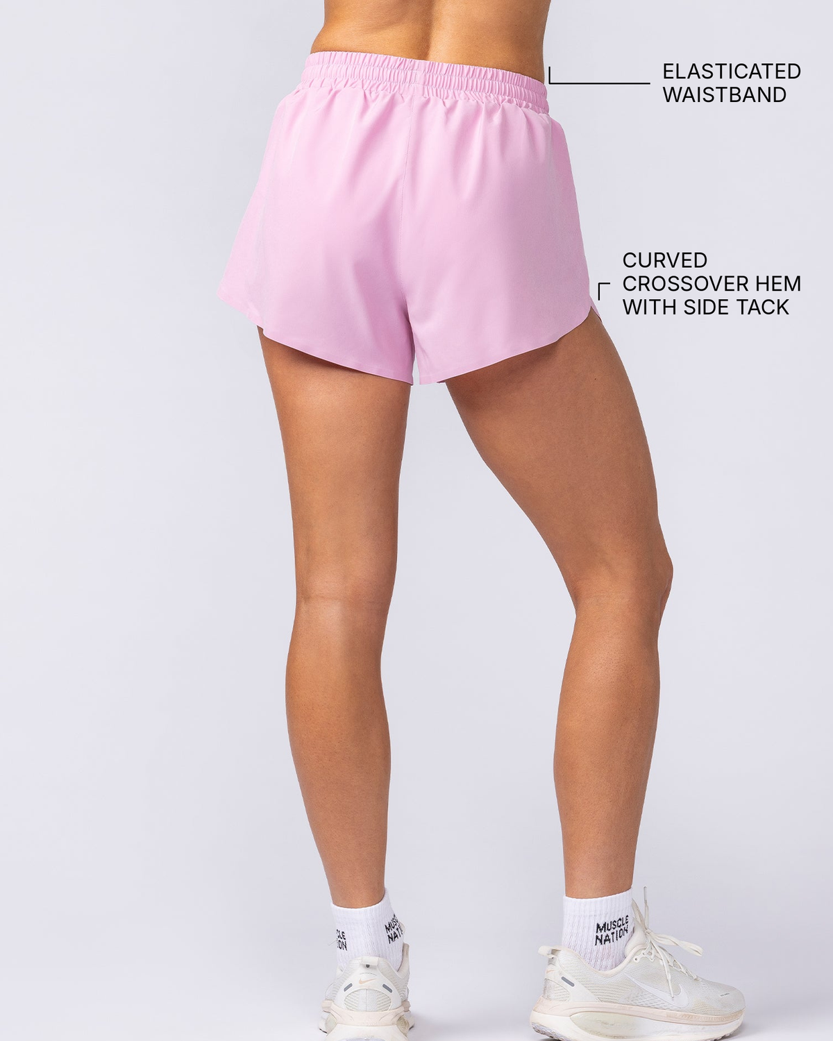 Pace 3" High-Waisted Run Shorts - Vintage Pink - Muscle Nation feature callouts: elasticated waistband, curved crossover hem with side tack