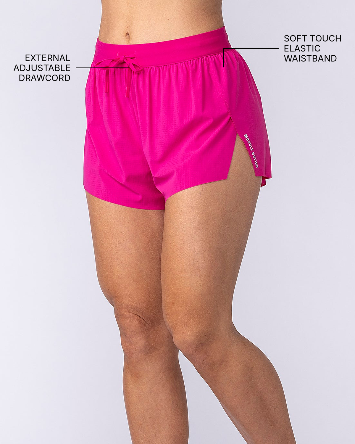 Tempo 3" Run Shorts - Raspberry - Muscle Nation feature callouts (side view): external adjustable drawcord, soft touch elastic waistband