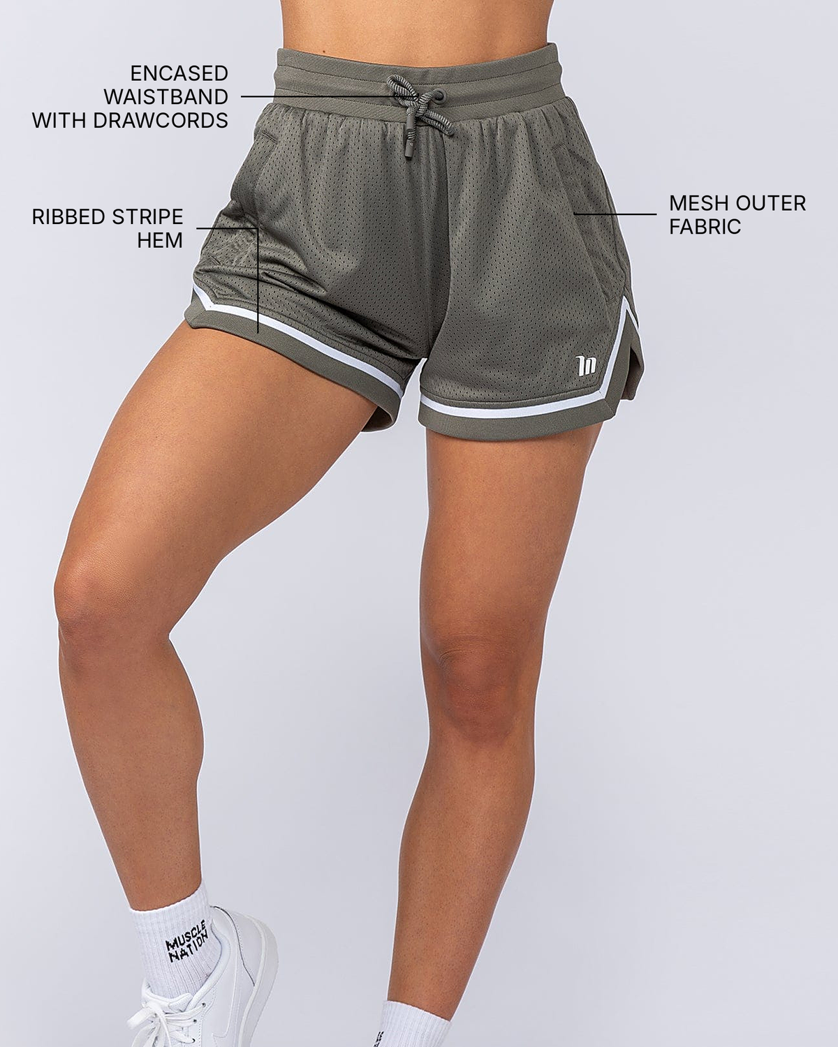 Womens 3" Basketball Shorts - Ivy - Muscle Nation feature callouts: encased waistband with drawcords, ribbed stripe hem, mesh outer fabric