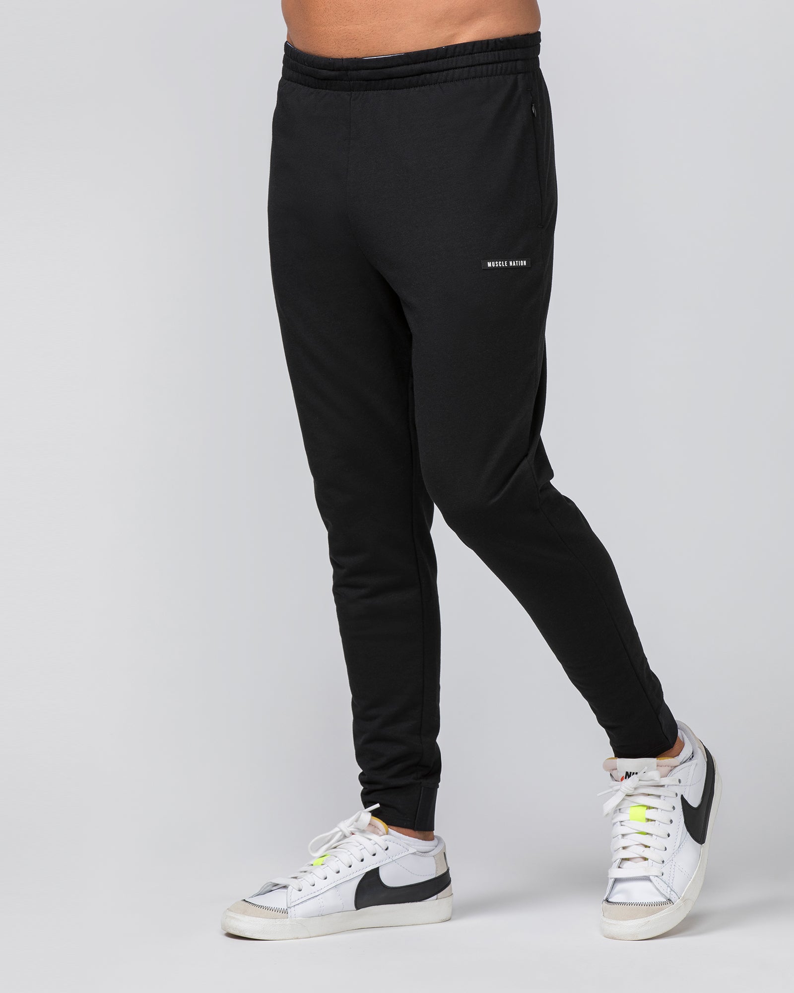 Black tapered joggers mens online