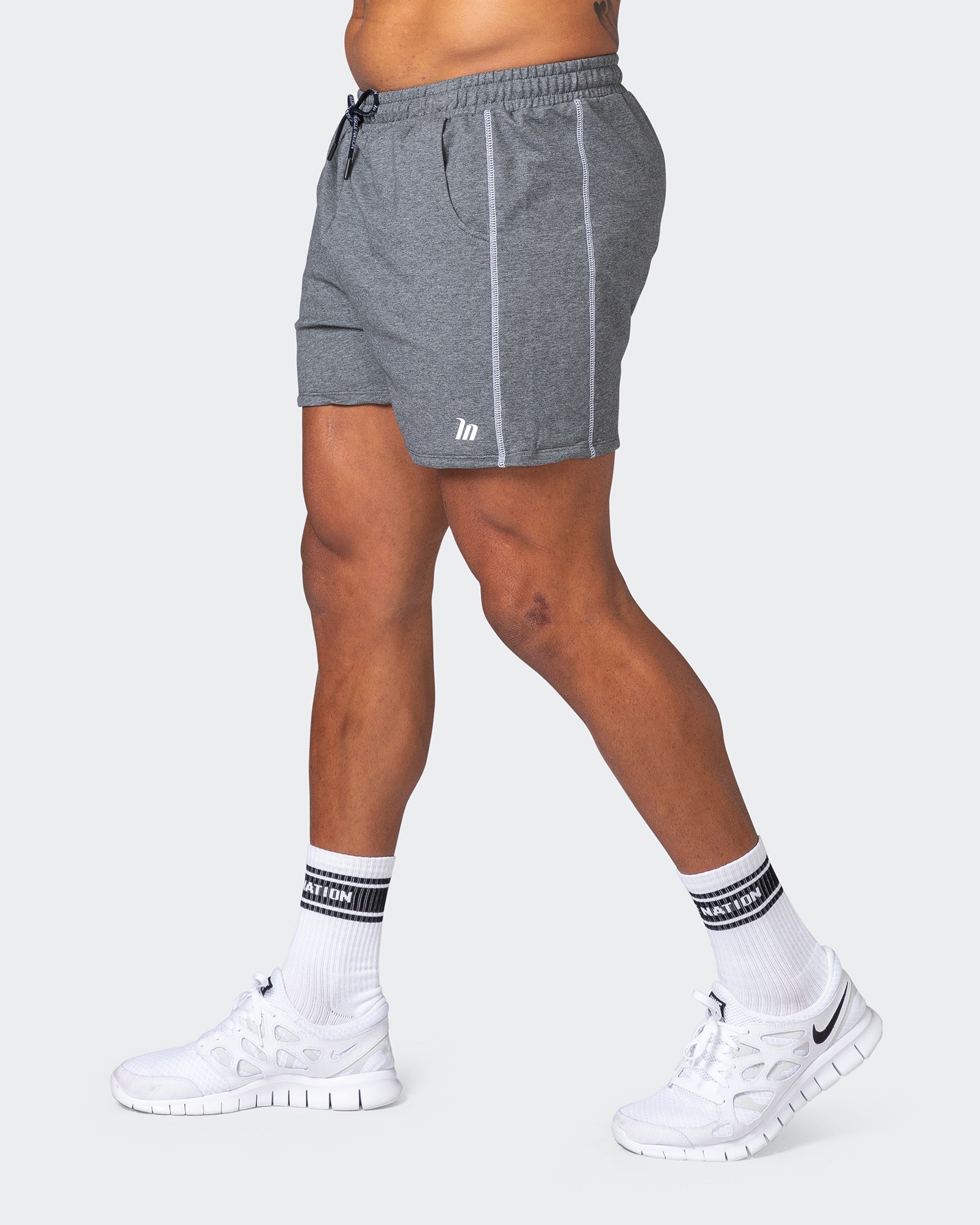 Dark grey shorts mens on sale outfit