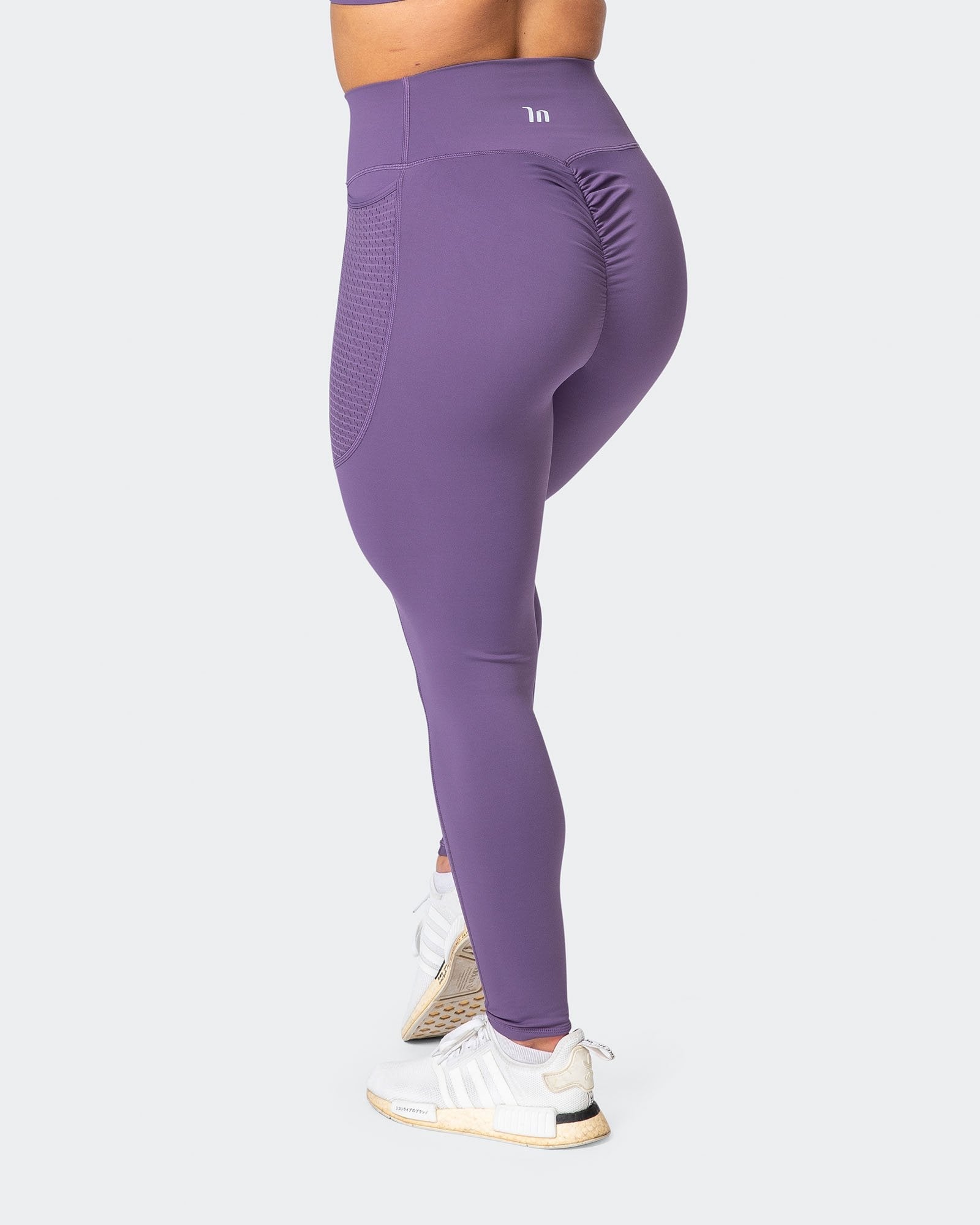 Huggy Women Light Purple Solid Ankle-Length Leggings (M) - Yavonne